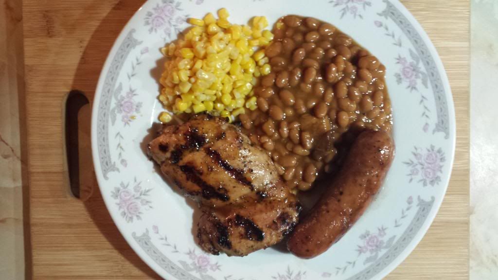 “SWEET-TENDER-JUICY CHICKEN THIGHS, CORN, BUSH’S BAKED BEANS, AND SAUSAGE.”